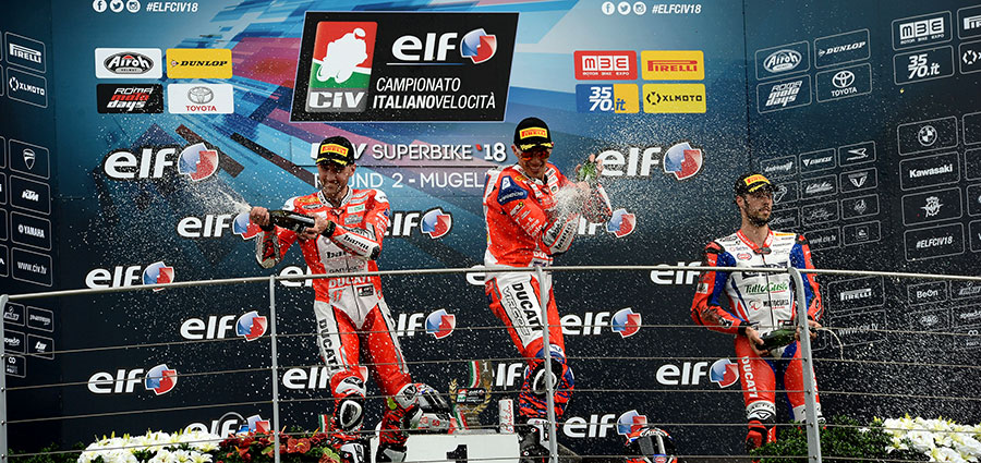 Il podio della SBK con Michele Pirro, Matteo Ferrari e Lorenzo Zanetti
